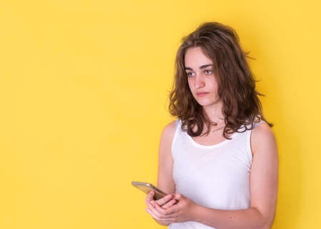 young woman using a mobile phoneの写真素材