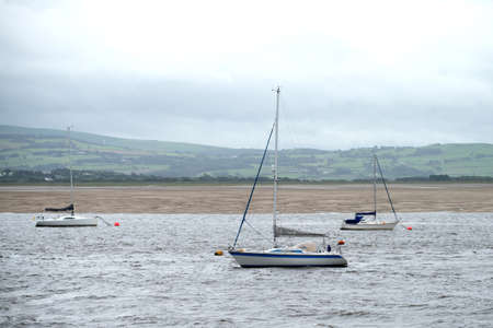 some boats in the bay in autumnの写真素材