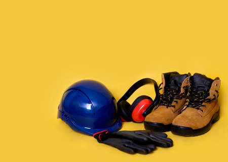 Construction Personal protective equipment on yellow backgroundの写真素材