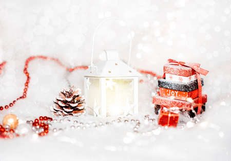 Christmas background with Christmas tree, white lantern, and decorationsの写真素材