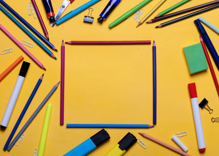 Mockup of pencils, highlighters on yellow backgroundの写真素材