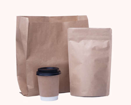 mock up of recycling  paper cup, paper bag, coffee bean bag on white backgroundの写真素材