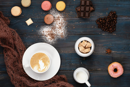 cup of coffee, cookies, doughnut, sweets, chocolates on wooden background