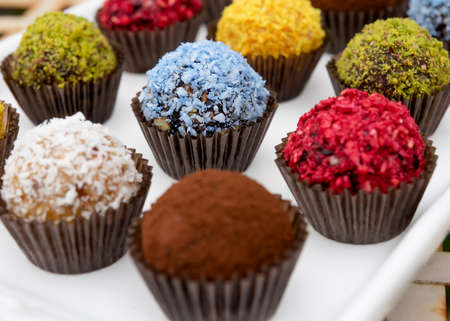 colourful  sweet balls with different tastes on white backgroundの写真素材
