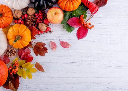 autumn wooden background with leaves, pumpkins Space for textの写真素材