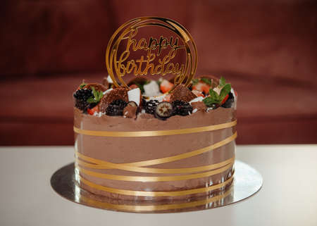 chocolate birthday cake on a table in rommの写真素材