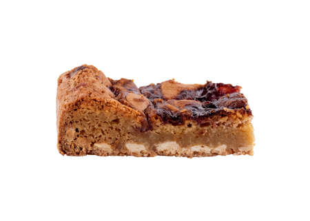 close up of a piece of    cake iwith chocolate solated on white backgroundの写真素材