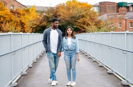 couple walking and hugging on the quays, pier, looking at yacht, sailboat, boat, having a fun, date. Lifestyle conceptの写真素材