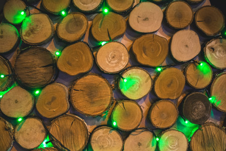 Abstract background with ideal round cut down trees with annual rings and cracks decorated with...