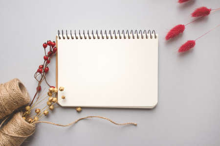 Linen or cannabis jute rolls for making natural body jute washclothes or washclothes for dishes, on light grey background with white page with copyspace for text. Handmade DIY and hobby conceptの写真素材