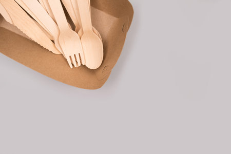 Disposable wooden cultery set made of natural bamboo - biodegradable, compostable cultery concept....