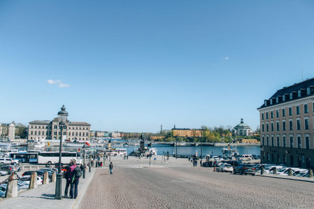 Stockholm, Sweden - May 1, 2019 : Scenic sunny day panorama of Stockholm city center from Royal Palace. City tour concept and spring vacation in Sweden. Selective focusのeditorial素材