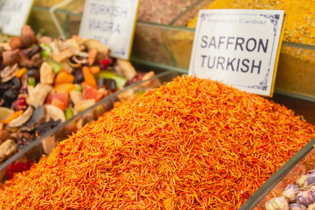 Saffron at the spices stall on turkish street market, selective focus