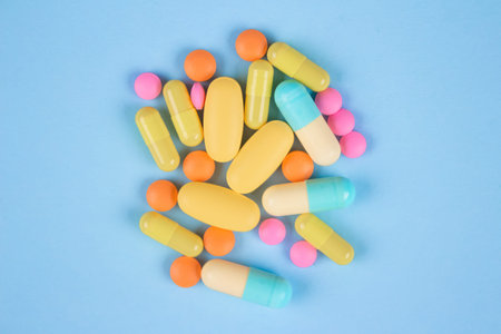 Variety of immune system vitamins and supplemets. Dietary bio supplements. Assorted multicolored...