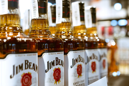 Lviv, Ukraine - February 20, 2022 : Bad Boy liquor store, bottles with Jim Beam Kentucky straight...