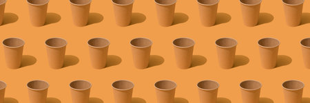 Banner, pattern with eco paper coffee cup on orange background, mockup image. Sustainable food...