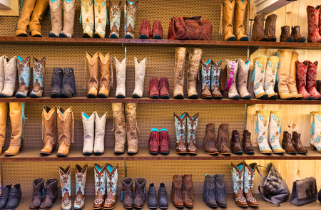 Cowboy boots on a shelf in a store, front viewの写真素材