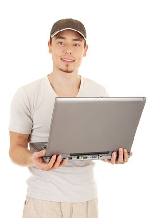 Handsome casual standing man with laptop on white backgroundの写真素材