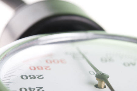 Medical manometer closeup with selective focus on 260 figure as concept of high blood preasure