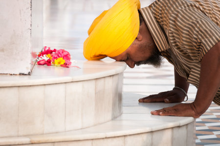Amritsar, India, August 26, 2011 - Praying Sick in The Harmandir Sahib Complex