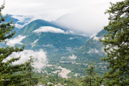 Fog in a valley between high mountains