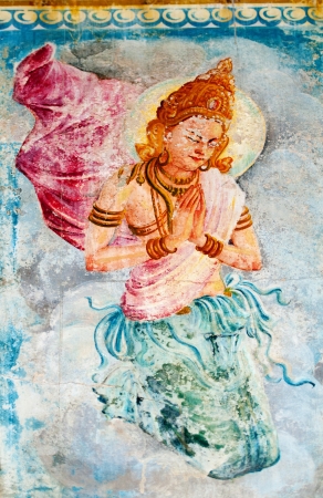 Traditional Sri Lanka style art with the buddhism angel - deva image on a wallのeditorial素材