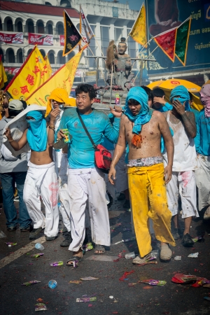 Phuket, Thailand - October 21, 2012: An unidentified people on street processions of Phuket Vegetarian Festival. It is an annual event held during the ninth lunar month of the Chinese calendar. のeditorial素材