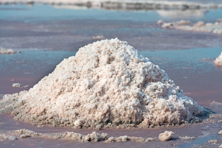 Salt pile in salt farm on Sambhar Salt Lake, India. It is India's largest saline lake and it produces 196 k tonnes of clean salt every year.の写真素材
