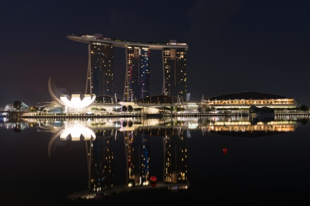SINGAPORE - JUN 2: The Marina Bay Sands Resort Hotel at night on Jun 02, 2013 in Singapore. It is an integrated resort and the worlds most expensive standalone casino property at SGD8 billion. のeditorial素材