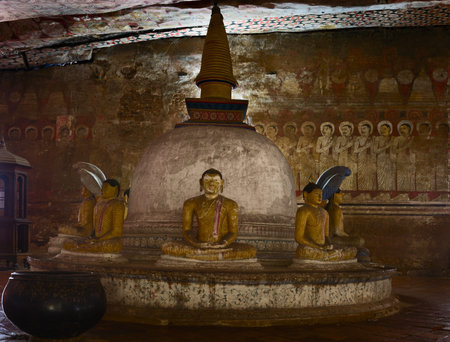 Stupa with ancient Buddha statues in Dambulla Cave Temple, Sri Lankaの写真素材
