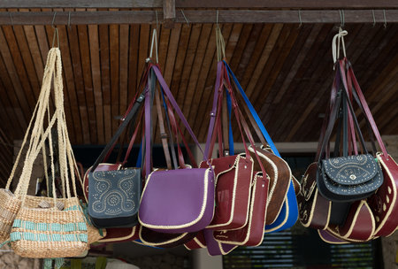 Handbags display on open street market shopの写真素材