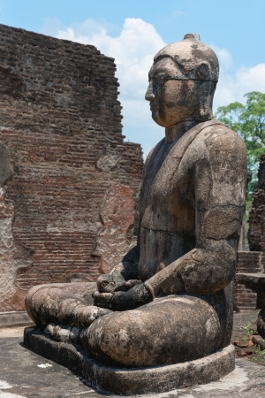 Ancient Buddha statue of temple ruins in ancient city of Polonnaruwa, Sri Lanka の写真素材