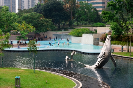KUALA LUMPUR - JUN 15: Pool in KLCC Park is a public pool located near Petronal twin towers on Jun 15, 2013 in Kuala Lumpur, Malaysia. 20 hectares park was designed by Roberto Burle Marx in 1980.のeditorial素材