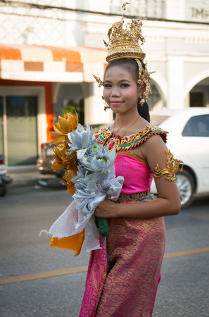 PHUKET, THAILAND - 07 FEB 2014: Beautiful girl take part in procession parade of annual old Phuket town festival. のeditorial素材