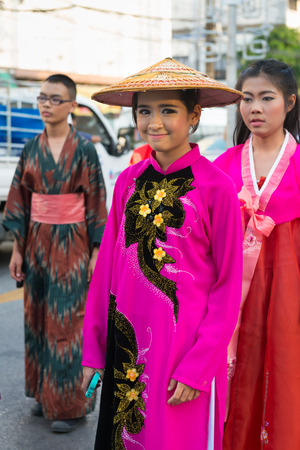 PHUKET, THAILAND - 07 FEB 2014: Phuket town residents take part in procession parade of annual old Phuket town festival. のeditorial素材