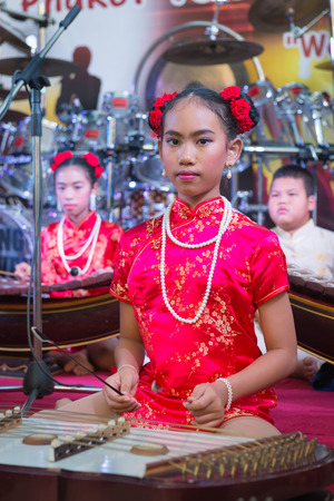 PHUKET, THAILAND - 07 FEB 2014: Unidentified musician(s) play on a stage during annual old Phuket town festival. のeditorial素材