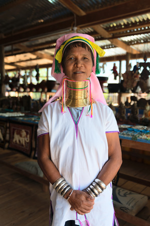 INLE LAKE, MYANMAR (BURMA) - 07 JAN 2014: Unidentified Padaung (Kayan Lahwi) tribe woman poses for a portrait. This tribe is called "long neck"ÂÂ because of metal rings around their necks.のeditorial素材