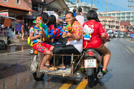 Phuket, Thailand - April 13, 2014: Tourist and residents celebrate Songkran Festival, the Thai New Year by splashing water to each others on Patong streets. のeditorial素材