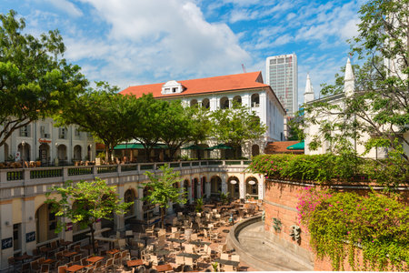 SINGAPORE - 02 JUN 2013: Courtyard with restaurants and bars in Chijmes. It is a historic building...