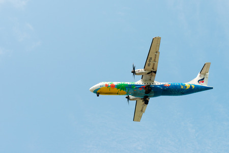 SAMUI, THAILAND - 04 MAR 2013: Flying Bangkok Airlines propeller-driven airplane in clean blue skyのeditorial素材