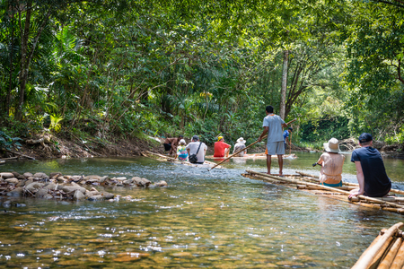KAO LAK, THAILAND - 24 FEB 2017: Bamboo rafting in green tropical scenery as a tour for tourist in Thailandのeditorial素材