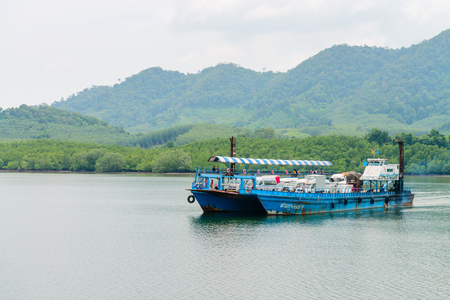 LANTA, KRABI, THAILAND - 17 OCT 2014: Ferry boat vessel for passengers and cars from mainland to Koh Lanta Noi island on the sea.のeditorial素材