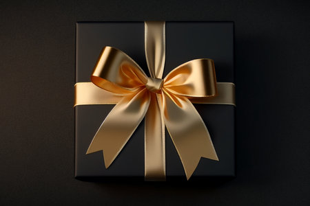 luxury Gift box with golden satin ribbon and bow on black background, Generative AIの素材