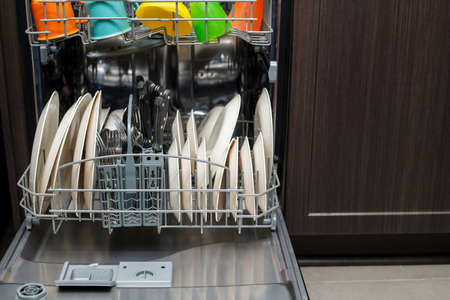 Dishwasher machine with clean utensilsの写真素材