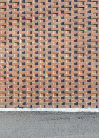 Red brick wall texture background. School building wall.