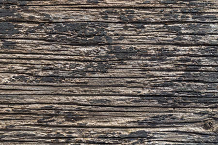 Old wooden background textured surface with peeling black paint. Abstract textureの写真素材