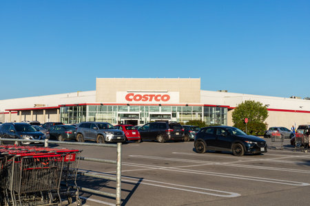 Ottawa, Canada - August 2, 2021: Costco Wholesale warehouse storefront and parking lot in Ottawa,...