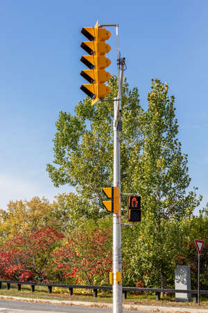 Traffic lights on the street of Ottawa city in Canada in fall season on a sunny day