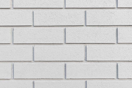 Close up of painted grey brick wall texture background.の写真素材