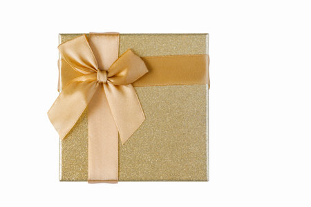 Golden gift box with ribbon isolated on white backgroundの写真素材